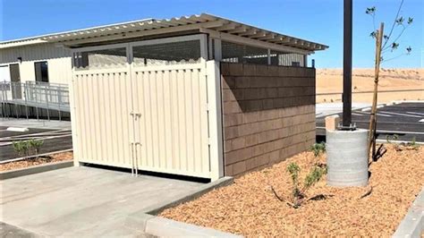 metal roofing detail trash enclosure|trash and recycling enclosure.